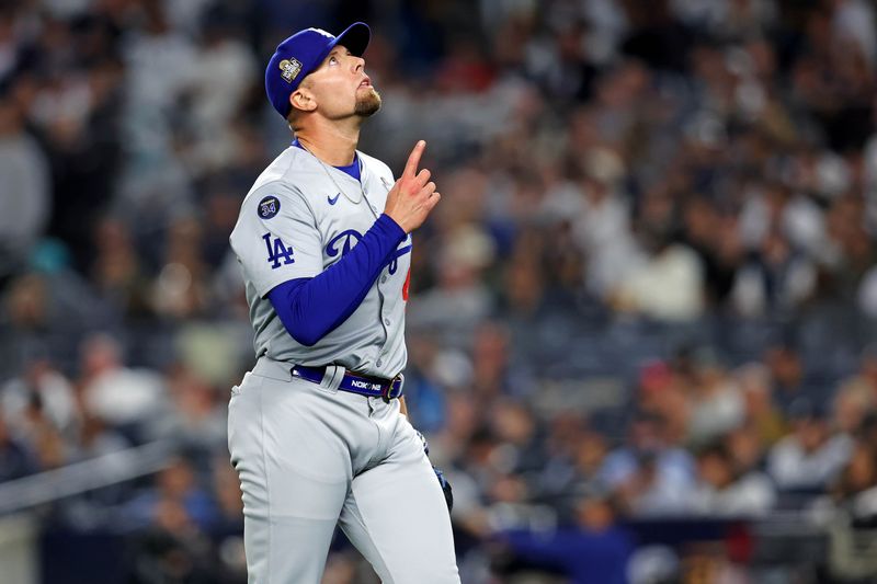 Oct 30, 2024; New York, New York, USA; Los Angeles Dodgers pitcher Blake Treinen (49) reacts after the seventh inning against the New York Yankees in game four of the 2024 MLB World Series at Yankee Stadium. Mandatory Credit: Brad Penner-Imagn Images