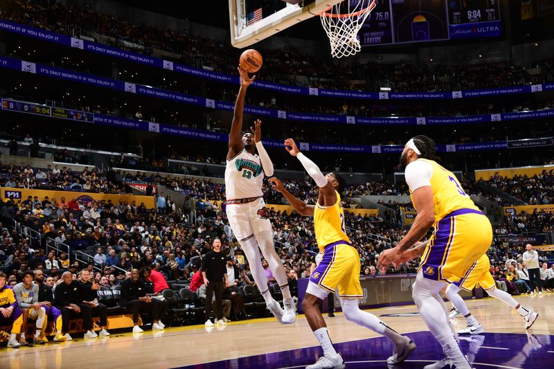 LOS ANGELES, CA - NOVEMBER 13: Jaren Jackson Jr. #13 of the Memphis Grizzlies shoots the ball during the game against the Los Angeles Lakers on November 13, 2024 at Crypto.Com Arena in Los Angeles, California. NOTE TO USER: User expressly acknowledges and agrees that, by downloading and/or using this Photograph, user is consenting to the terms and conditions of the Getty Images License Agreement. Mandatory Copyright Notice: Copyright 2024 NBAE (Photo by Adam Pantozzi/NBAE via Getty Images)