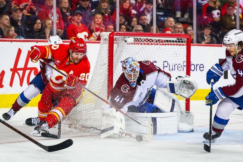 Mar 14, 2025; Calgary, Alberta, CAN; Colorado Avalanche goaltender Scott Wedgewood (41) makes a save against Calgary Flames left wing Blake Coleman (20) during the second period at Scotiabank Saddledome. Mandatory Credit: Sergei Belski-Imagn Images