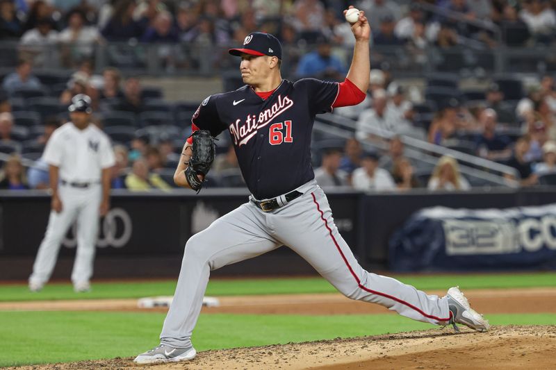 Aug 23, 2023; Bronx, New York, USA; Washington Nationals relief pitcher Robert Garcia (61) delivers a pitch during the fifth inning against the New York Yankees at Yankee Stadium. Mandatory Credit: Vincent Carchietta-USA TODAY Sports