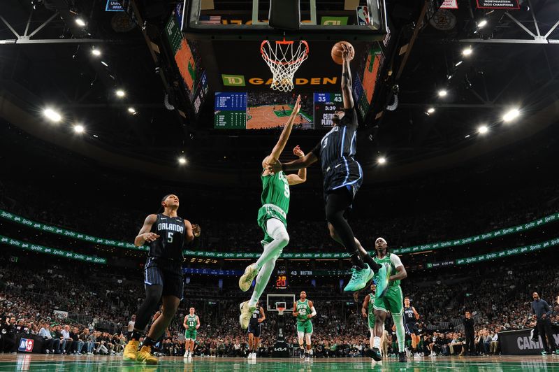 BOSTON, MA - APRIL 23:   Kentavious Caldwell-Pope #3 of the Orlando Magic drives to the basket during the game against the Boston Celtics during Round 1 Game 2 of the 2025 NBA Playoffs on April 23, 2025 at TD Garden in Boston, Massachusetts. NOTE TO USER: User expressly acknowledges and agrees that, by downloading and/or using this Photograph, user is consenting to the terms and conditions of the Getty Images License Agreement. Mandatory Copyright Notice: Copyright 2025 NBAE (Photo by Brian Babineau/NBAE via Getty Images)