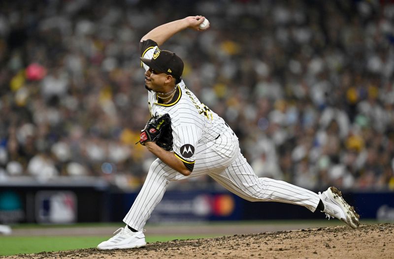 Oct 9, 2024; San Diego, California, USA; San Diego Padres pitcher Jeremiah Estrada (56) throws in the sixth inning against the Los Angeles Dodgers during game four of the NLDS for the 2024 MLB Playoffs at Petco Park.  Mandatory Credit: Denis Poroy-Imagn Images