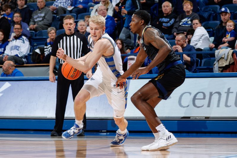 Mar 4, 2023; Colorado Springs, Colorado, USA; Air Force Falcons forward Rytis Petraitis (31) controls the ball as San Jose State Spartans guard Omari Moore (10) guards in the second half at Clune Arena. Mandatory Credit: Isaiah J. Downing-USA TODAY Sports