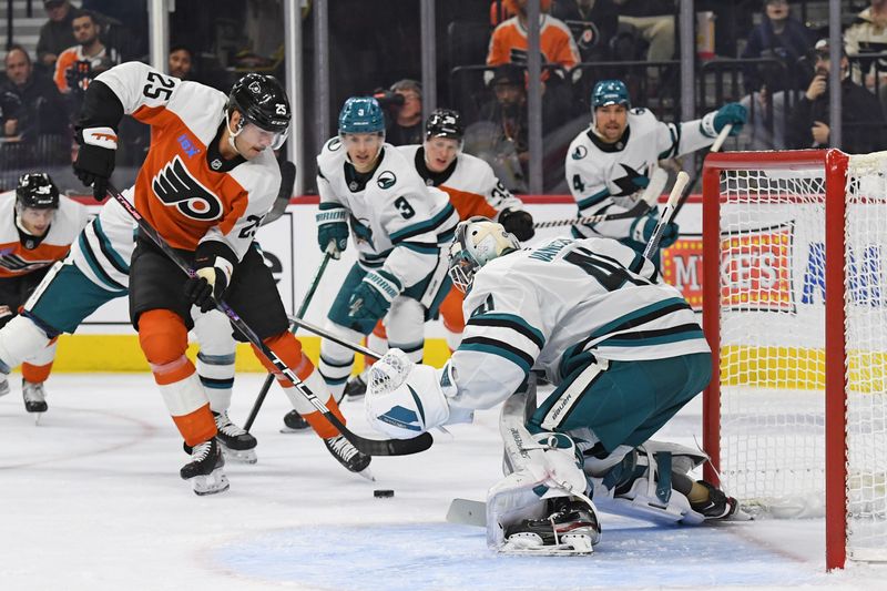 Nov 11, 2024; Philadelphia, Pennsylvania, USA; Philadelphia Flyers center Ryan Poehling (25) takes a shot on goal against San Jose Sharks goaltender Vitek Vanecek (41) during the first period at Wells Fargo Center. Mandatory Credit: Eric Hartline-Imagn Images