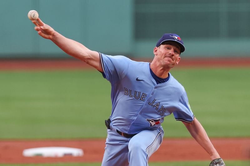 Jun 24, 2024; Boston, Massachusetts, USA; Toronto Blue Jays starting pitcher Chris Bassitt (40) throws a pitch during the first inning against the Boston Red Sox at Fenway Park. Mandatory Credit: Paul Rutherford-USA TODAY Sports