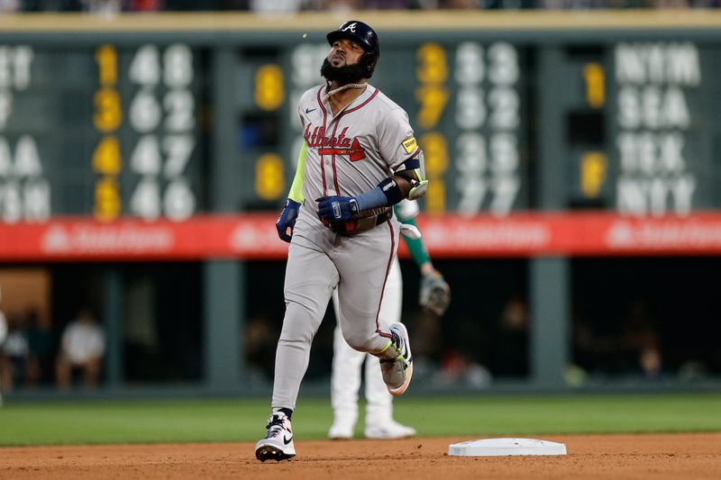 Aug 10, 2024; Denver, Colorado, USA; Atlanta Braves designated hitter Marcell Ozuna (20) rounds the bases on a solo home run in the fifth inning against the Colorado Rockies at Coors Field. Mandatory Credit: Isaiah J. Downing-USA TODAY Sports