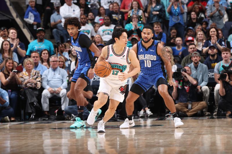 MEMPHIS, TN - OCTOBER 26: Yuki Kawamura #17 of the Memphis Grizzlies handles the ball during the game against the Orlando Magic on October 26, 2024 at FedExForum in Memphis, Tennessee. NOTE TO USER: User expressly acknowledges and agrees that, by downloading and or using this photograph, User is consenting to the terms and conditions of the Getty Images License Agreement. Mandatory Copyright Notice: Copyright 2024 NBAE (Photo by Joe Murphy/NBAE via Getty Images)