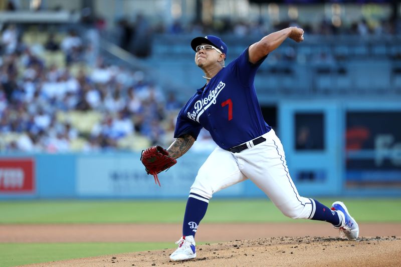 Aug 3, 2023; Los Angeles, California, USA;  Los Angeles Dodgers starting pitcher Julio Urias (7) pitches during the first inning against the Oakland Athletics at Dodger Stadium. Mandatory Credit: Kiyoshi Mio-USA TODAY Sports