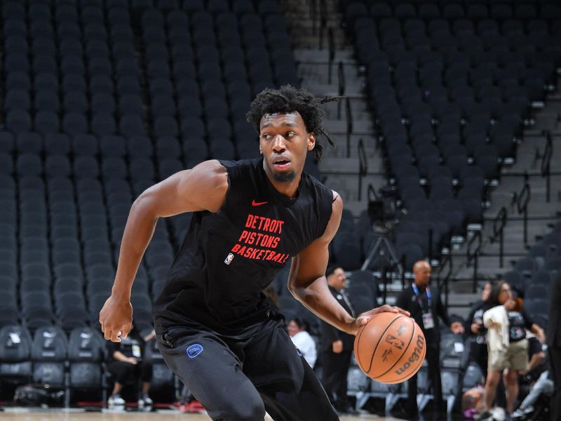 SAN ANTONIO, TX - APRIL 14: James Wiseman #13 of the Detroit Pistons warms up before the game the game  against the San Antonio Spurs on April 14, 2024 at the Frost Bank Center in San Antonio, Texas. NOTE TO USER: User expressly acknowledges and agrees that, by downloading and or using this photograph, user is consenting to the terms and conditions of the Getty Images License Agreement. Mandatory Copyright Notice: Copyright 2024 NBAE (Photos by Michael Gonzales/NBAE via Getty Images)