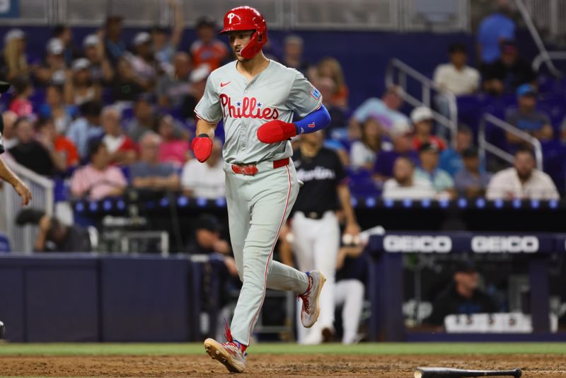 Sep 6, 2024; Miami, Florida, USA; Philadelphia Phillies shortstop Trea Turner (7) scores against the Miami Marlins during the fifth inning at loanDepot Park. Mandatory Credit: Sam Navarro-Imagn Images