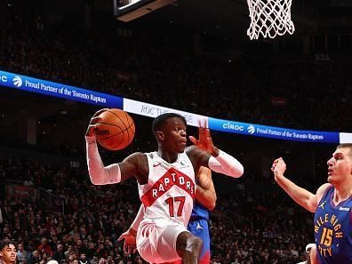 TORONTO, CANADA - DECEMBER 20: Dennis Schroder #17 of the Toronto Raptors passes the ball during the game against the Denver Nuggets on December 20, 2023 at the Scotiabank Arena in Toronto, Ontario, Canada.  NOTE TO USER: User expressly acknowledges and agrees that, by downloading and or using this Photograph, user is consenting to the terms and conditions of the Getty Images License Agreement.  Mandatory Copyright Notice: Copyright 2023 NBAE (Photo by Vaughn Ridley/NBAE via Getty Images)