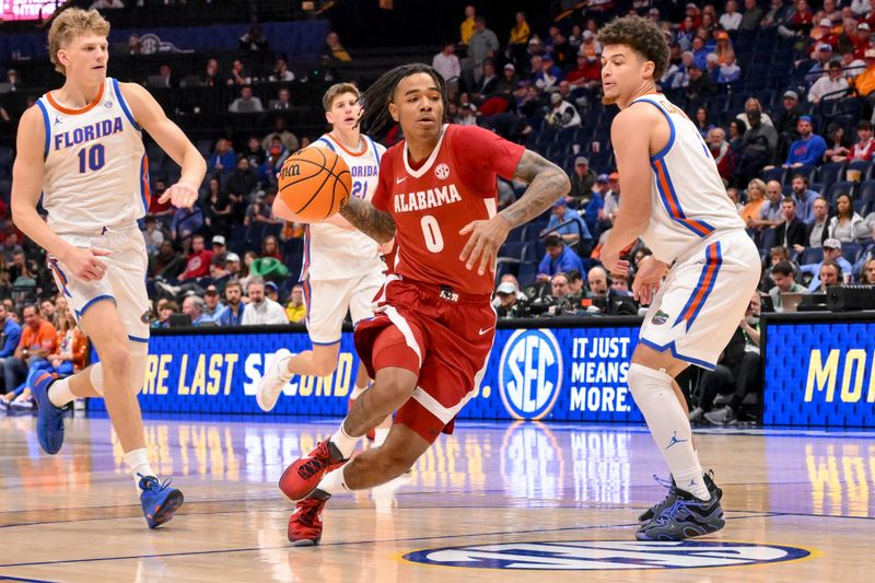 Mar 15, 2025; Nashville, TN, USA;  Alabama Crimson Tide guard Labaron Philon (0) drives to the basket against the Florida Gators during the second half at Bridgestone Arena. Mandatory Credit: Steve Roberts-Imagn Images