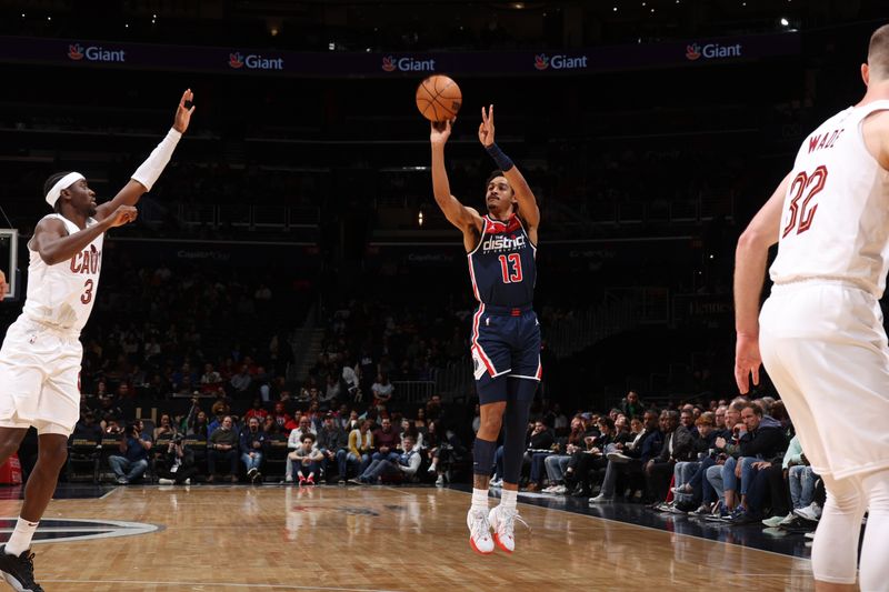 WASHINGTON, DC -? FEBRUARY 7: Jordan Poole #13 of the Washington Wizards shoots a three point basket during the game against the Cleveland Cavaliers on February 7, 2024 at Capital One Arena in Washington, DC. NOTE TO USER: User expressly acknowledges and agrees that, by downloading and or using this Photograph, user is consenting to the terms and conditions of the Getty Images License Agreement. Mandatory Copyright Notice: Copyright 2024 NBAE (Photo by Stephen Gosling/NBAE via Getty Images)