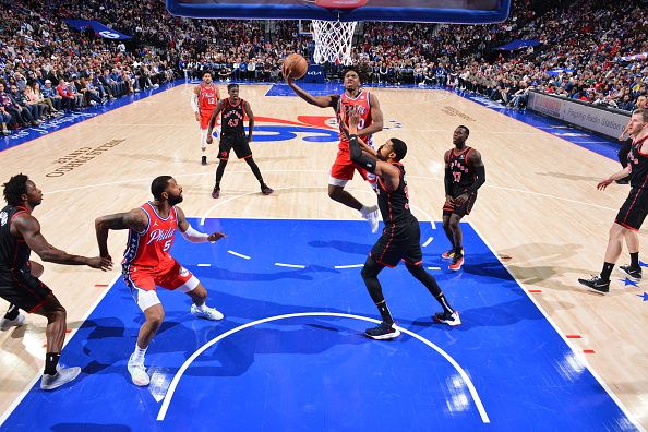 PHILADELPHIA, PA - DECEMBER 22: Tyrese Maxey #0 of the Philadelphia 76ers drives to the basket during the game against the Toronto Raptors on December 22, 2023 at the Wells Fargo Center in Philadelphia, Pennsylvania NOTE TO USER: User expressly acknowledges and agrees that, by downloading and/or using this Photograph, user is consenting to the terms and conditions of the Getty Images License Agreement. Mandatory Copyright Notice: Copyright 2023 NBAE (Photo by Jesse D. Garrabrant/NBAE via Getty Images)