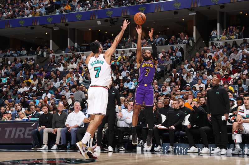 MEMPHIS, TN - NOVEMBER 6: Gabe Vincent #7 of the Los Angeles Lakers shoots the ball during the game against the Memphis Grizzlies on November 6, 2024 at FedExForum in Memphis, Tennessee. NOTE TO USER: User expressly acknowledges and agrees that, by downloading and or using this photograph, User is consenting to the terms and conditions of the Getty Images License Agreement. Mandatory Copyright Notice: Copyright 2024 NBAE (Photo by Joe Murphy/NBAE via Getty Images)