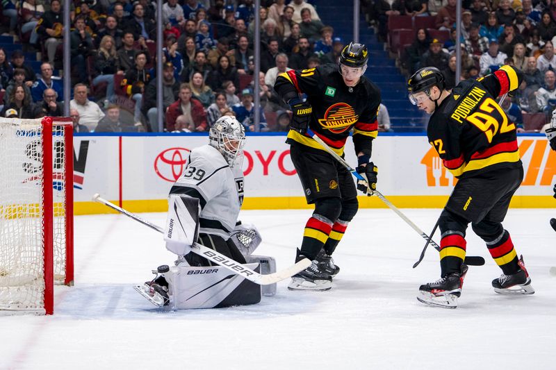 Mar 25, 2024; Vancouver, British Columbia, CAN; Vancouver Canucks forward Vasily Podkolzin (92) and defenseman Nikita Zadorov (91) watch Los Angeles Kings goalie Cam Talbot (39) make a save in the third period at Rogers Arena. Kings won 3 -2. Mandatory Credit: Bob Frid-USA TODAY Sports