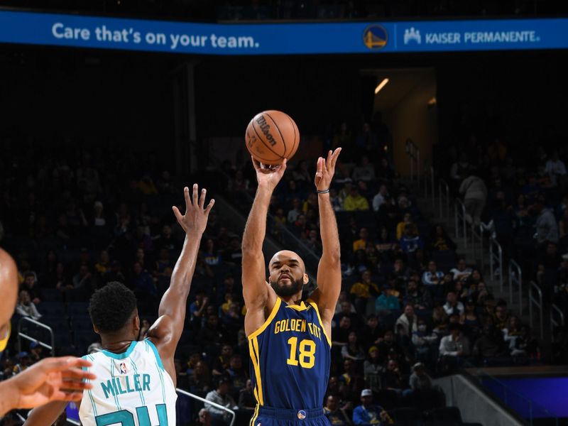 SAN FRANCISCO, CA - FEBRUARY 23: Jerome Robinson #18 of the Golden State Warriors  shoots a three point basket against the Charlotte Hornets on February 23, 2024 at Chase Center in San Francisco, California. NOTE TO USER: User expressly acknowledges and agrees that, by downloading and or using this photograph, user is consenting to the terms and conditions of Getty Images License Agreement. Mandatory Copyright Notice: Copyright 2024 NBAE (Photo by Noah Graham/NBAE via Getty Images)