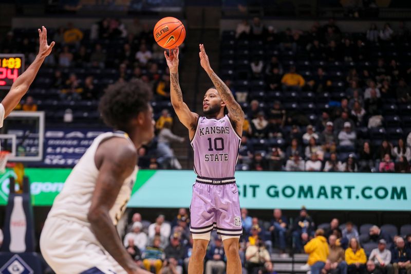 Jan 27, 2026; Morgantown, West Virginia, USA; Kansas State Wildcats guard David Castillo (10) shoots during the first half against the West Virginia Mountaineers at Hope Coliseum. Mandatory Credit: Ben Queen-Imagn Imagesa