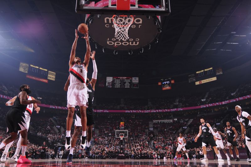 PORTLAND, OR - MARCH 22:  Kris Murray #8 of the Portland Trail Blazers goes to the basket during the game on March 22, 2024 at the Moda Center Arena in Portland, Oregon. NOTE TO USER: User expressly acknowledges and agrees that, by downloading and or using this photograph, user is consenting to the terms and conditions of the Getty Images License Agreement. Mandatory Copyright Notice: Copyright 2024 NBAE (Photo by Cameron Browne/NBAE via Getty Images)