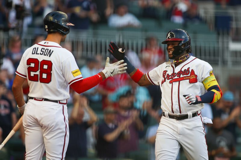 Sep 7, 2023; Atlanta, Georgia, USA; Atlanta Braves right fielder Ronald Acuna Jr. (13) celebrates after a home run with first baseman Matt Olson (28) against the St. Louis Cardinals in the first inning at Truist Park. Mandatory Credit: Brett Davis-USA TODAY Sports
