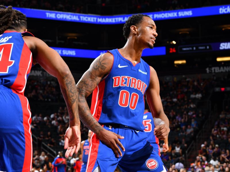 PHOENIX, AZ - OCTOBER 11: Ron Holland II #00 of the Detroit Pistons celebrates during the game against the Phoenix Suns during a NBA preseason game on October 11, 2024 at Footprint Center in Phoenix, Arizona. NOTE TO USER: User expressly acknowledges and agrees that, by downloading and or using this photograph, user is consenting to the terms and conditions of the Getty Images License Agreement. Mandatory Copyright Notice: Copyright 2024 NBAE (Photo by Barry Gossage/NBAE via Getty Images)