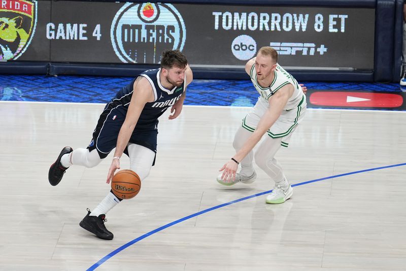 DALLAS, TX - JUNE 14: Luka Doncic #77 of the Dallas Mavericks drives to the basket during the game against the Boston Celtics during Game Four of the 2024 NBA Finals on June 14, 2024 at the American Airlines Center in Dallas, Texas. NOTE TO USER: User expressly acknowledges and agrees that, by downloading and or using this photograph, User is consenting to the terms and conditions of the Getty Images License Agreement. Mandatory Copyright Notice: Copyright 2024 NBAE (Photo by Glenn James/NBAE via Getty Images)