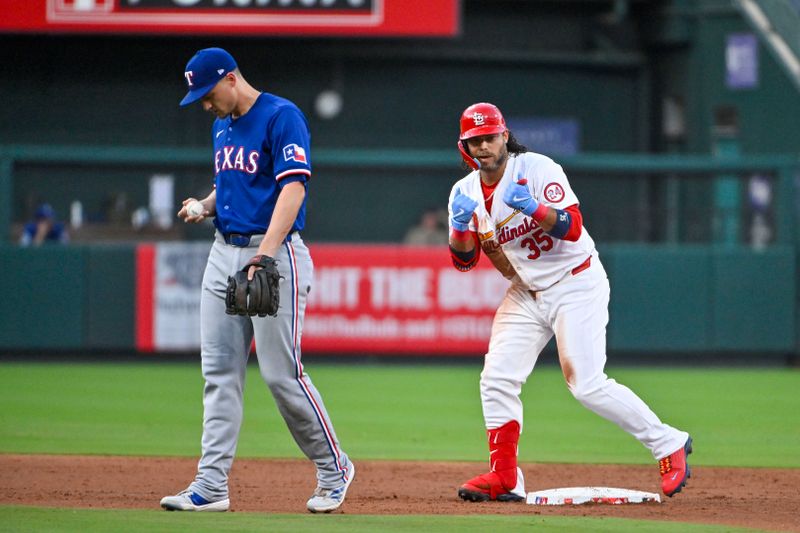 Jul 30, 2024; St. Louis, Missouri, USA;  St. Louis Cardinals third baseman Brandon Crawford (35) reacts after hitting a one run double against the Texas Rangers at Busch Stadium. Mandatory Credit: Jeff Curry-USA TODAY Sports