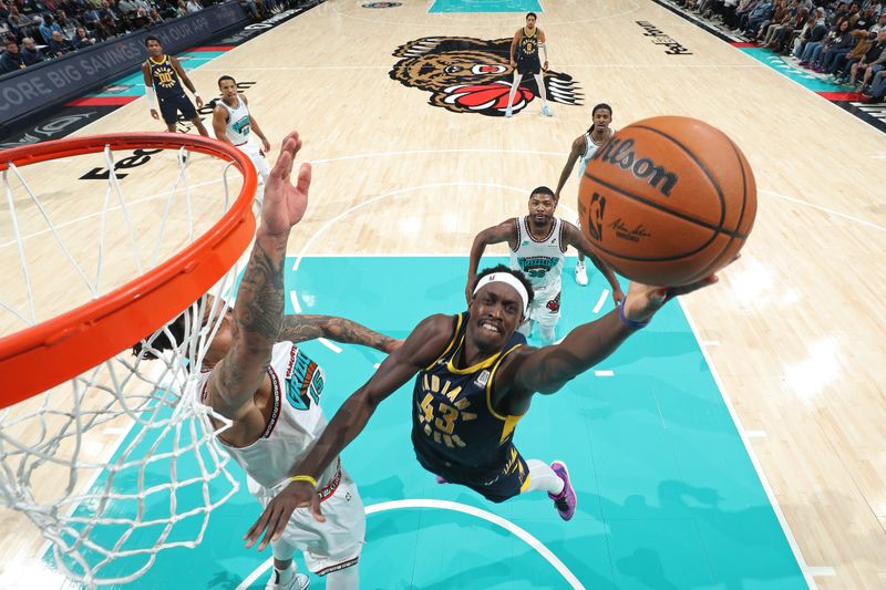 MEMPHIS, TN - DECEMBER 1: Pascal Siakam #43 of the Indiana Pacers drives to the basket during the game against the Memphis Grizzlies on December 1, 2024 at FedExForum in Memphis, Tennessee. NOTE TO USER: User expressly acknowledges and agrees that, by downloading and or using this photograph, User is consenting to the terms and conditions of the Getty Images License Agreement. Mandatory Copyright Notice: Copyright 2024 NBAE (Photo by Joe Murphy/NBAE via Getty Images)