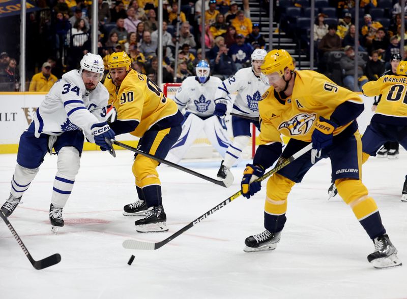 Mar 22, 2025; Nashville, Tennessee, USA; Toronto Maple Leafs center Auston Matthews (34) chases a loose puck as Nashville Predators center Steven Stamkos (91) moves in to control it during the third period of the game at Bridgestone Arena. Mandatory Credit: Alan Poizner-Imagn Images