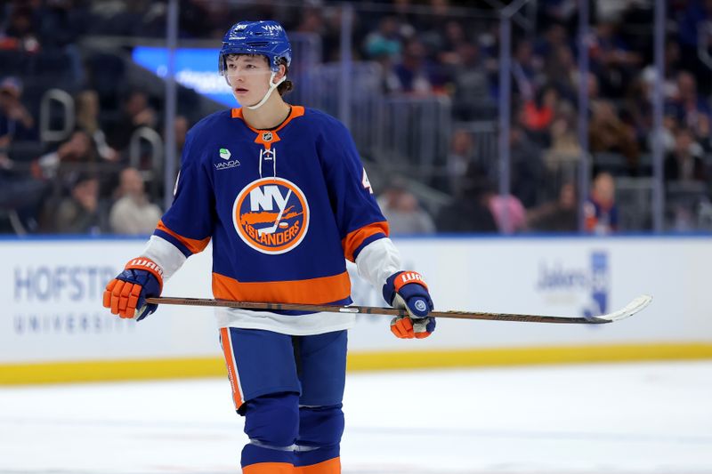 Oct 11, 2025; Elmont, New York, USA; New York Islanders defenseman Matthew Schaefer (48) skates against the Washington Capitals during the second period at UBS Arena. Mandatory Credit: Brad Penner-Imagn Images