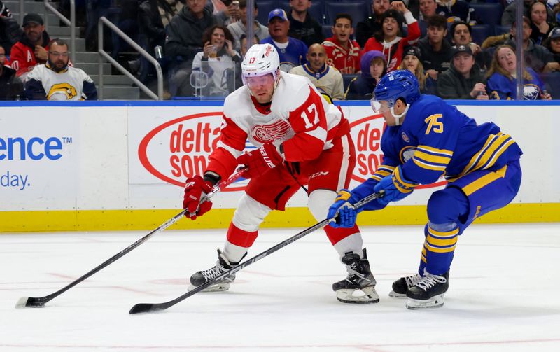 Dec 5, 2023; Buffalo, New York, USA;  Buffalo Sabres defenseman Connor Clifton (75) looks to block a shot by Detroit Red Wings right wing Daniel Sprong (17) during the third period at KeyBank Center. Mandatory Credit: Timothy T. Ludwig-USA TODAY Sports