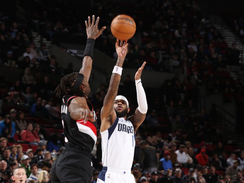 PORTLAND, OR - DECEMBER 1: Jaden Hardy #1 of the Dallas Mavericks shoots the ball during the game against the Portland Trail Blazers on December 1, 2024 at the Moda Center Arena in Portland, Oregon. NOTE TO USER: User expressly acknowledges and agrees that, by downloading and or using this photograph, user is consenting to the terms and conditions of the Getty Images License Agreement. Mandatory Copyright Notice: Copyright 2024 NBAE (Photo by Cameron Browne/NBAE via Getty Images)