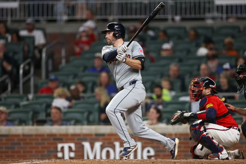 Apr 26, 2024; Atlanta, Georgia, USA; Cleveland Guardians first baseman David Fry (6) hits a RBI single against the Atlanta Braves in the ninth inning at Truist Park. Mandatory Credit: Brett Davis-USA TODAY Sports