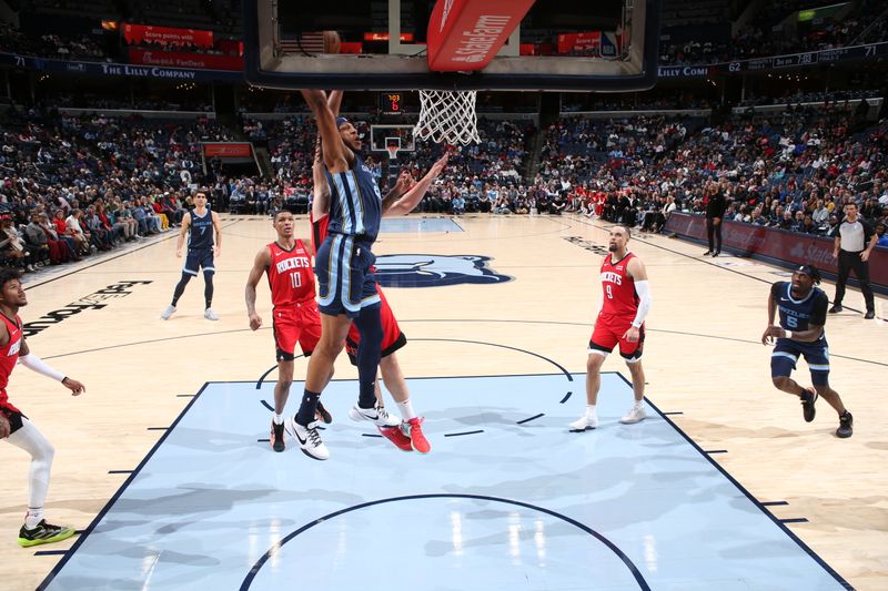 MEMPHIS, TN - FEBRUARY 14: Lamar Stevens #24 of the Memphis Grizzlies drives to the basket during the game against the Houston Rockets on February 14, 2024 at FedExForum in Memphis, Tennessee. NOTE TO USER: User expressly acknowledges and agrees that, by downloading and or using this photograph, User is consenting to the terms and conditions of the Getty Images License Agreement. Mandatory Copyright Notice: Copyright 2024 NBAE (Photo by Joe Murphy/NBAE via Getty Images)