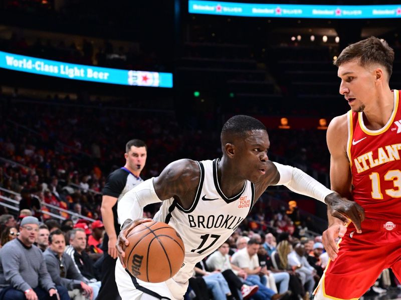 PORTLAND, OR - OCTOBER 23: Dennis Schroder #17 of the Brooklyn Nets dribbles the ball during the game against the Atlanta Hawks on October 23, 2024 at the Moda Center Arena in Portland, Oregon. NOTE TO USER: User expressly acknowledges and agrees that, by downloading and or using this photograph, user is consenting to the terms and conditions of the Getty Images License Agreement. Mandatory Copyright Notice: Copyright 2024 NBAE (Photo by Cameron Browne/NBAE via Getty Images)