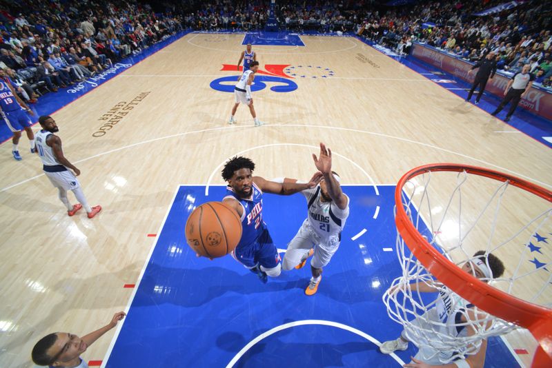 PHILADELPHIA, PA - FEBRUARY 4: Joel Embiid #21 of the Philadelphia 76ers drives to the basket during the game against the Dallas Mavericks on February 4, 2025 at the Wells Fargo Center in Philadelphia, Pennsylvania NOTE TO USER: User expressly acknowledges and agrees that, by downloading and/or using this Photograph, user is consenting to the terms and conditions of the Getty Images License Agreement. Mandatory Copyright Notice: Copyright 2025 NBAE (Photo by Jesse D. Garrabrant/NBAE via Getty Images)