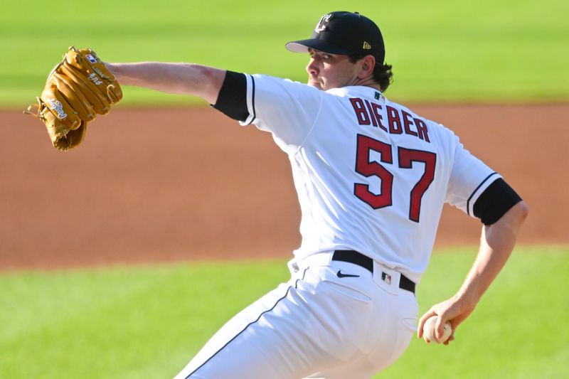 Jul 4, 2023; Cleveland, Ohio, USA; Cleveland Guardians starting pitcher Shane Bieber (57) delivers a pitch in the first inning against the Atlanta Bravesb at Progressive Field. Mandatory Credit: David Richard-USA TODAY Sports