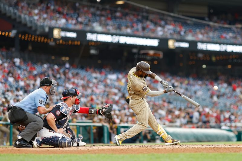 Jul 24, 2024; Washington, District of Columbia, USA; San Diego Padres outfielder Jurickson Profar (10) hits a two run home run against the Washington Nationals during the second inning at Nationals Park. Mandatory Credit: Geoff Burke-USA TODAY Sports