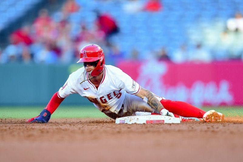 Aug 13, 2024; Anaheim, California, USA; Los Angeles Angels shortstop Zach Neto (9) steals second against the Toronto Blue Jays during the first inning at Angel Stadium. Mandatory Credit: Gary A. Vasquez-USA TODAY Sports