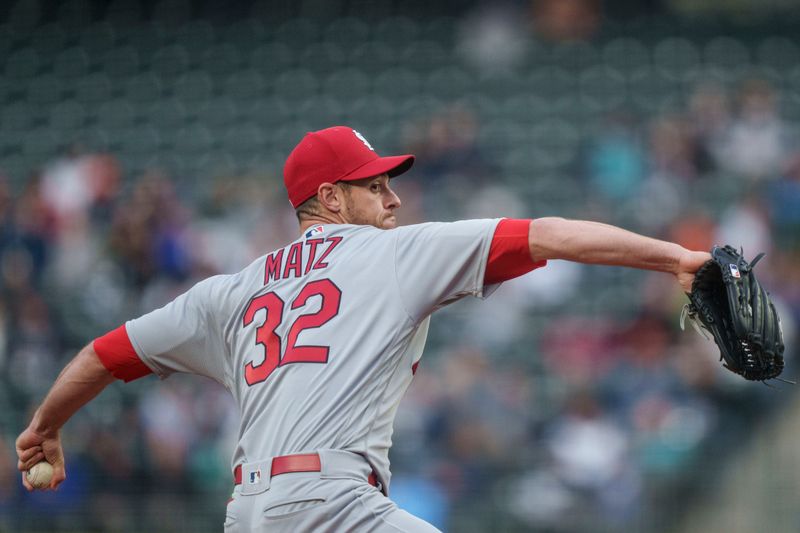 Apr 21, 2023; Seattle, Washington, USA; St. Louis Cardinals starter Steven Matz (32) delivers a pitch during the first inning against the Seattle Marinersat T-Mobile Park. Mandatory Credit: Stephen Brashear-USA TODAY Sports