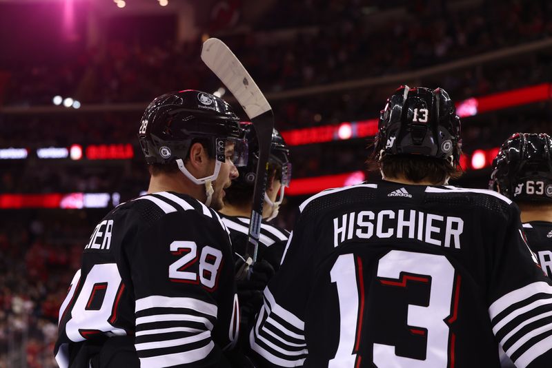 Apr 15, 2024; Newark, New Jersey, USA; New Jersey Devils right wing Timo Meier (28) celebrates his goal against the New York Islanders during the second period at Prudential Center. Mandatory Credit: Ed Mulholland-USA TODAY Sports