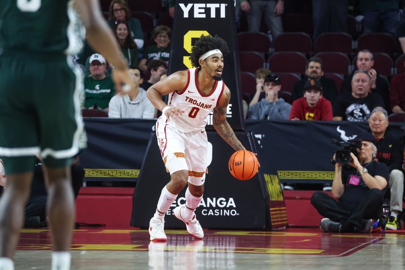 Feb 1, 2025; Los Angeles, California, USA;  USC Trojans forward Saint Thomas (0) calls out a teammate against the Michigan State Spartans during the first half at Galen Center. Mandatory Credit: William Navarro-Imagn Images