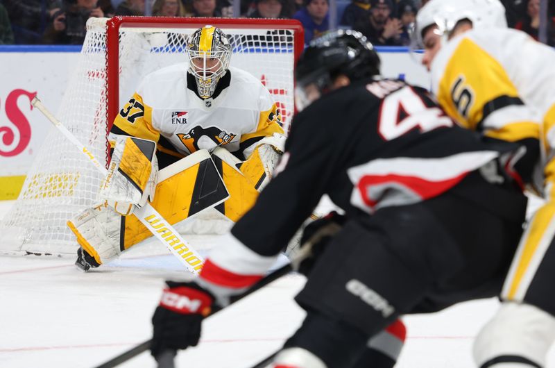 Feb 5, 2026; Buffalo, New York, USA;  Pittsburgh Penguins goaltender Arturs Silovs (37) looks for the puck during the second period against the Buffalo Sabres at KeyBank Center. Mandatory Credit: Timothy T. Ludwig-Imagn Images