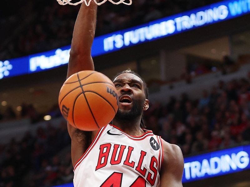 CHICAGO, ILLINOIS - DECEMBER 23: Patrick Williams #44 of the Chicago Bulls dunks against the Cleveland Cavaliers during the second half at the United Center on December 23, 2023 in Chicago, Illinois. NOTE TO USER: User expressly acknowledges and agrees that, by downloading and or using this photograph, User is consenting to the terms and conditions of the Getty Images License Agreement.  (Photo by Michael Reaves/Getty Images)