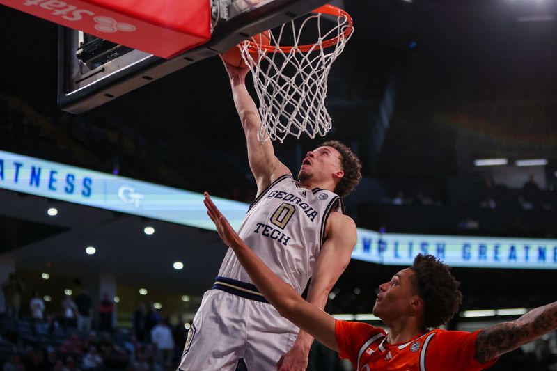 Mar 4, 2025; Atlanta, Georgia, USA; Georgia Tech Yellow Jackets guard Lance Terry (0) dunks against the Miami Hurricanes in the second half at McCamish Pavilion. Mandatory Credit: Brett Davis-Imagn Images