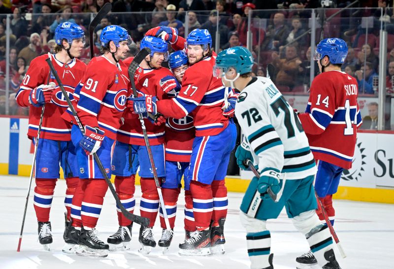 Jan 11, 2024; Montreal, Quebec, CAN; Montreal Canadiens defenseman Mike Matheson (8) celebrates with teammates forward Cole Caufield (22) and forward Juraj Slafkovsky (20) and  forward Sean Monahan (91) and forward Josh Anderson (17) and  forward Nick Suzuki (14) after scoring a goal against the San Jose Sharks during the third period at the Bell Centre. Mandatory Credit: Eric Bolte-USA TODAY Sports