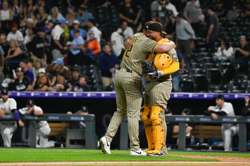 May 10, 2025; Denver, Colorado, USA; San Diego Padres catcher Elias Díaz (17) gives a hug to San Diego Padres pitcher Stephen Kolek (32) for his complete game and shutout against the Colorado Rockies at Coors Field. Mandatory Credit: John Leyba-Imagn Images