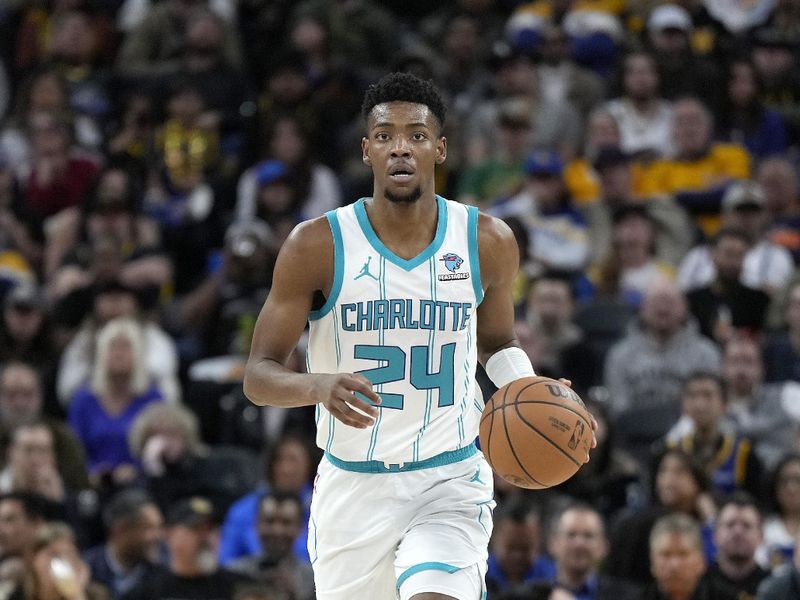 SAN FRANCISCO, CALIFORNIA - FEBRUARY 23: Brandon Miller #24 of the Charlotte Hornets dribbles the ball up court against the Golden State Warriors during the fourth quarter of an NBA basketball game at Chase Center on February 23, 2024 in San Francisco, California. NOTE TO USER: User expressly acknowledges and agrees that, by downloading and or using this photograph, User is consenting to the terms and conditions of the Getty Images License Agreement. (Photo by Thearon W. Henderson/Getty Images)