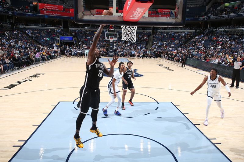 MEMPHIS, TN - February 26:  Dorian Finney-Smith #28 of the Brooklyn Nets drives to the basket during the game against the Memphis Grizzlies on February 26, 2024 at FedExForum in Memphis, Tennessee. NOTE TO USER: User expressly acknowledges and agrees that, by downloading and or using this photograph, User is consenting to the terms and conditions of the Getty Images License Agreement. Mandatory Copyright Notice: Copyright 2024 NBAE (Photo by Joe Murphy/NBAE via Getty Images)