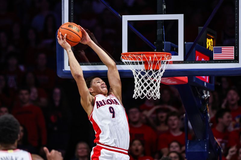 Mar 4, 2025; Tucson, Arizona, USA; Arizona Wildcats forward Carter Bryant (9) dunks the ball during the first half against the Arizona State Sun Devils at McKale Center. Mandatory Credit: Aryanna Frank-Imagn Images
